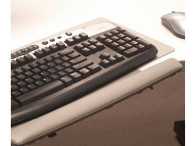 Close-Up of keyboard on a Grey Keyboard Platform with a mouse nearby