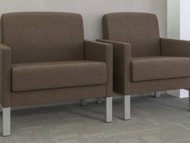 Brown Leela bariatric lounge arm chair and a Leela one-seat armchair