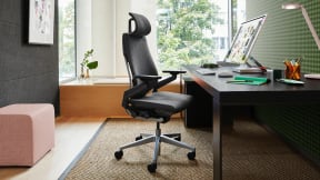 Inside a private office with a black Gesture chair with head rest