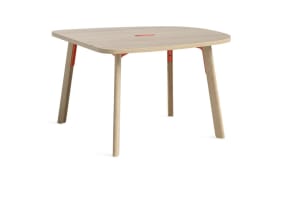 on-white image of a Verlay gumdrop table with wood legs