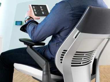 man viewing tablet in Gesture office chair