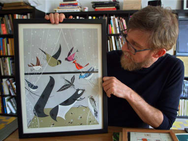 Charlier Harper, Designtex displaying a framed drawing of a squirrel and birds