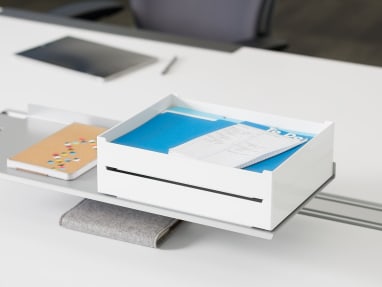 White and Blue SOTO Pile Box on a workstation surface