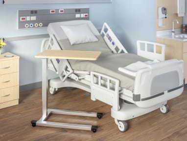 Overbed Table next to a hospital bed