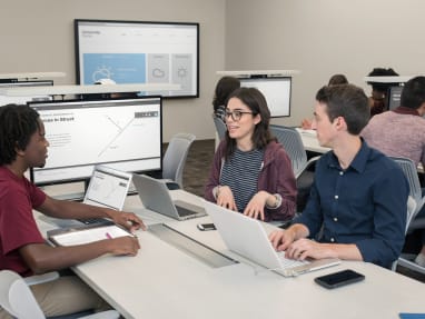 Classroom at the Texas A&M, students collaborating while sitting on Cobi chairs