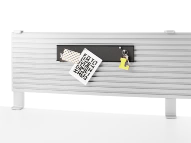 On-white image of a tackstrip being used with a slatwall.