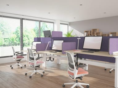 Work stations with purple Divisio screens and pink office chairs