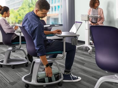 Ergonomic chair deals with desk attached