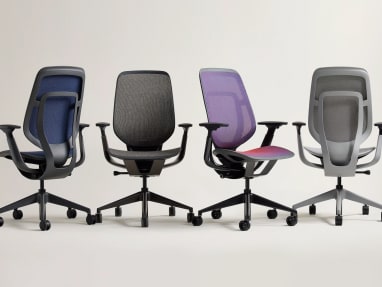 four Karman Chairs showing up on a white enviroment in different colors