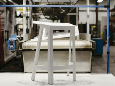 An image showing up a chair on a factory environment