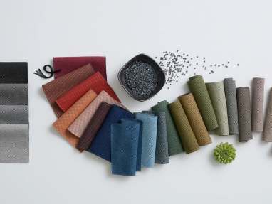 A selection of Parcel Loop material in different colors, on a gray background