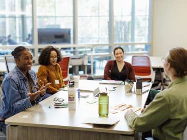 People on a table having a conversation