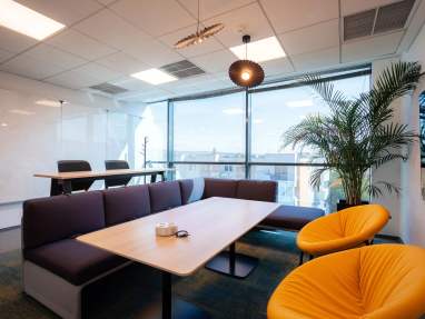 RebelDot Office environment featuring Viccarbe Zoco Lounge Chairs Lagunitas bench