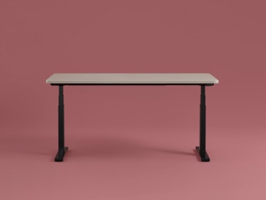 Steelcase Solo Sit-to-Stand Desk in studio environment