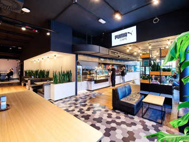 Inside the New Café at PUMA’s Global Headquarters showcasing Steelcase products