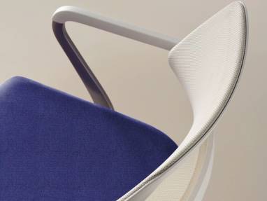 Steelcase QiVi Conference Chair detail showing mesh backrest, upholstered seat and integrated armrest