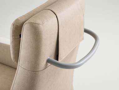 close up to a handle on the back part of a apprise recliner