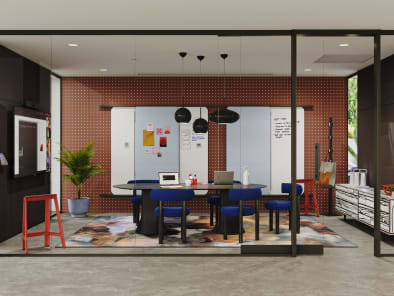 Idea for hybrid office conference room design with clear walls, wall-mounted monitors, seating, and conference tables with portable whiteboard outside