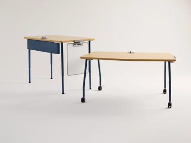 Verb tables by Steelcase Learning on a light gray background