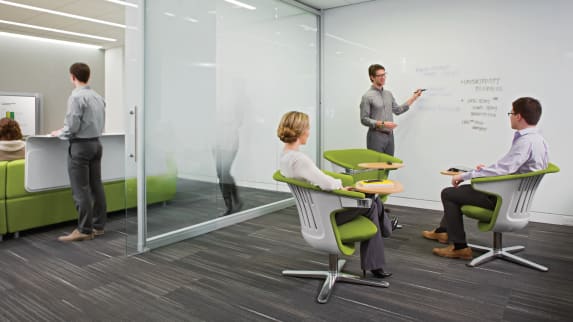 People sitting on i2i chairs