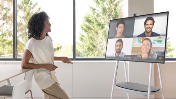 Woman participates in a video conference while using a Steelcase Roam