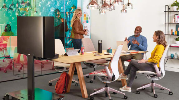 Office environment showing up people working