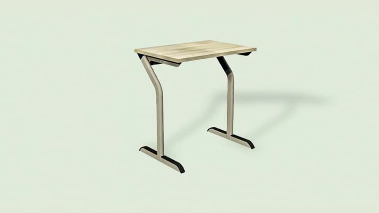 Vanerum Versa M Student Table on a green background