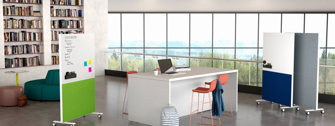 Open space in an office showcasing Polyvision, big table, and flex