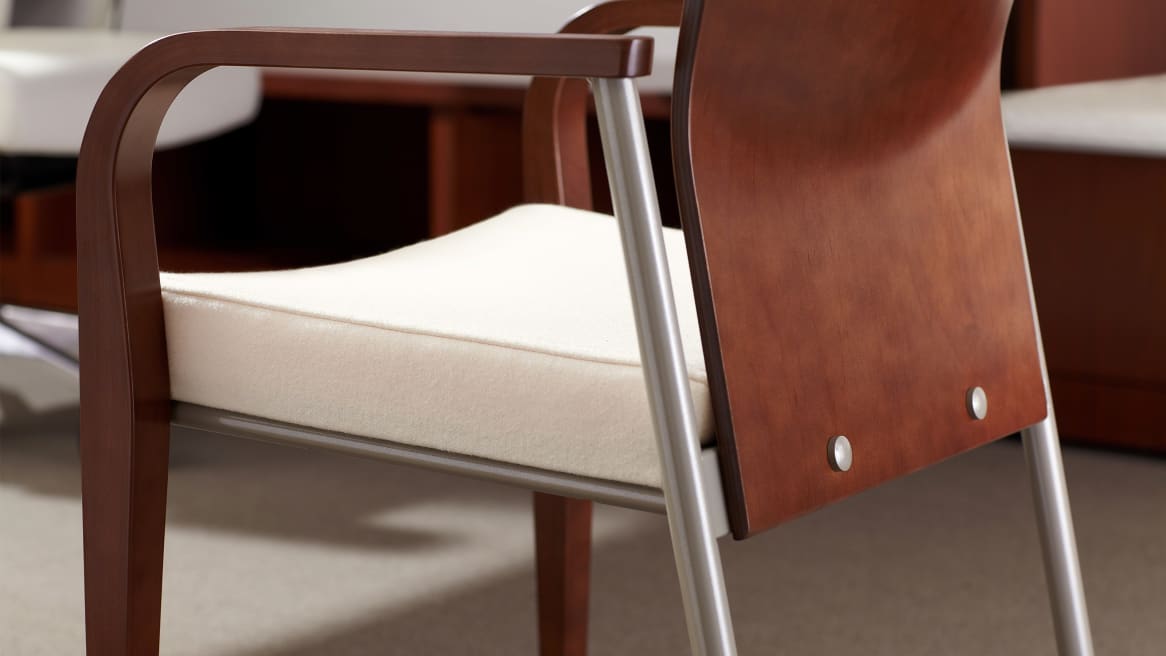 Mingle Guest Chair with white seat and medium walnut wood arms and back