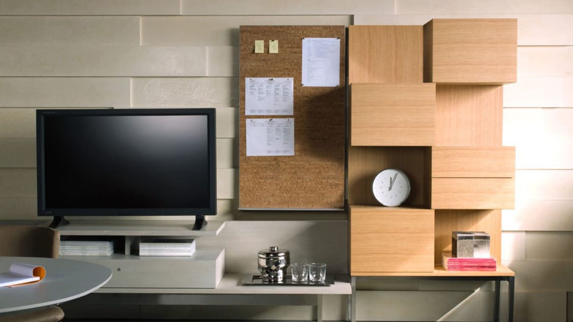 Denizen Storage Tower + Wardrobe next to a monitor