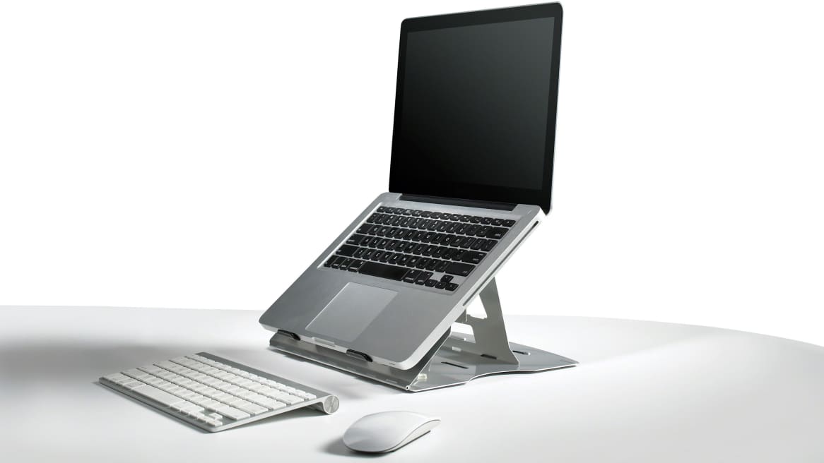 Mobile Laptop Support with a laptop opened on a desk with a keyboard