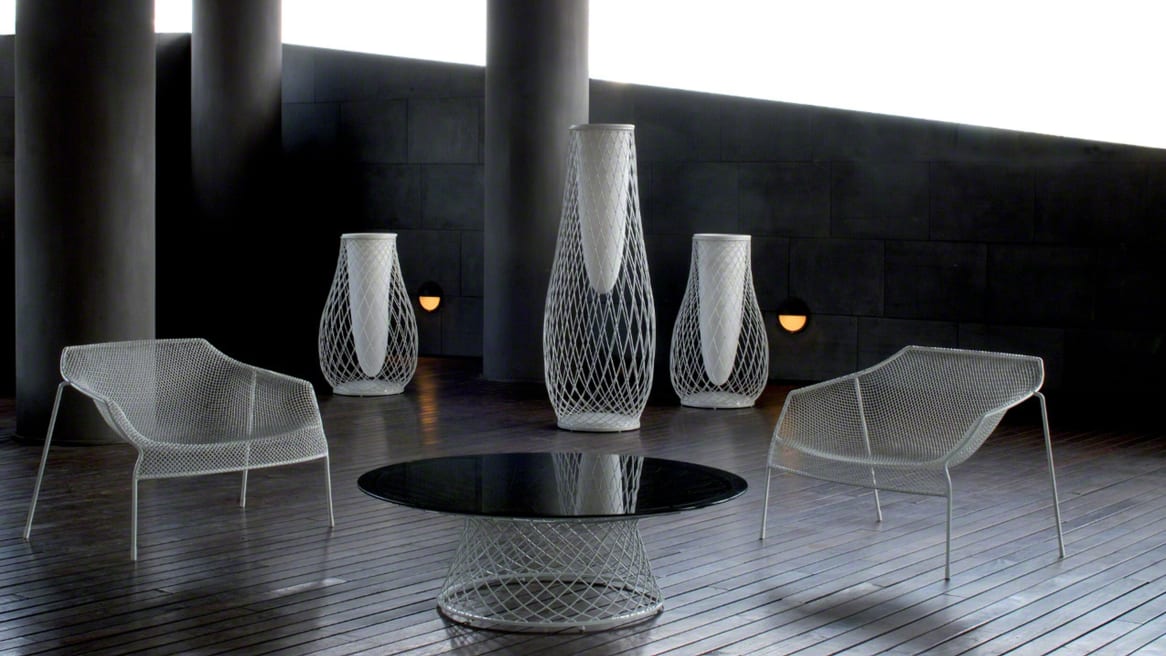 Three White Emu Heaven Vases in a lounge area