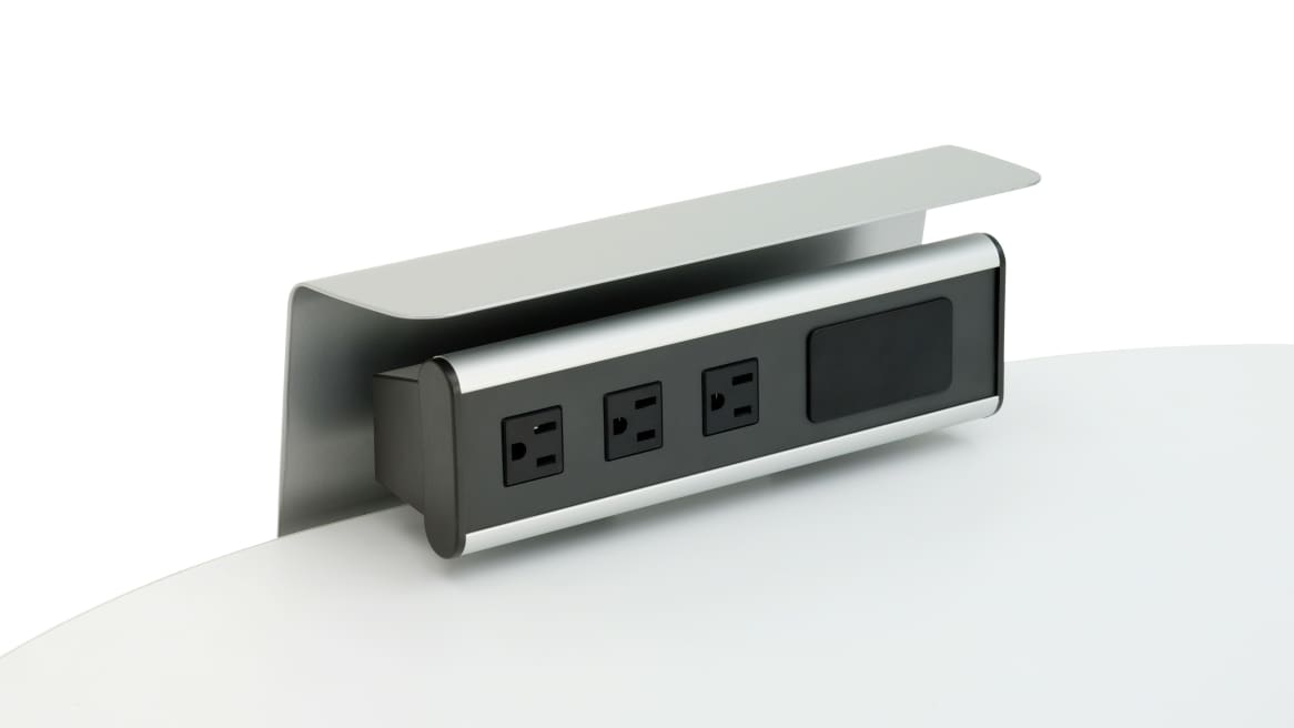Close-up of a power outlet on a ScapeSeries table