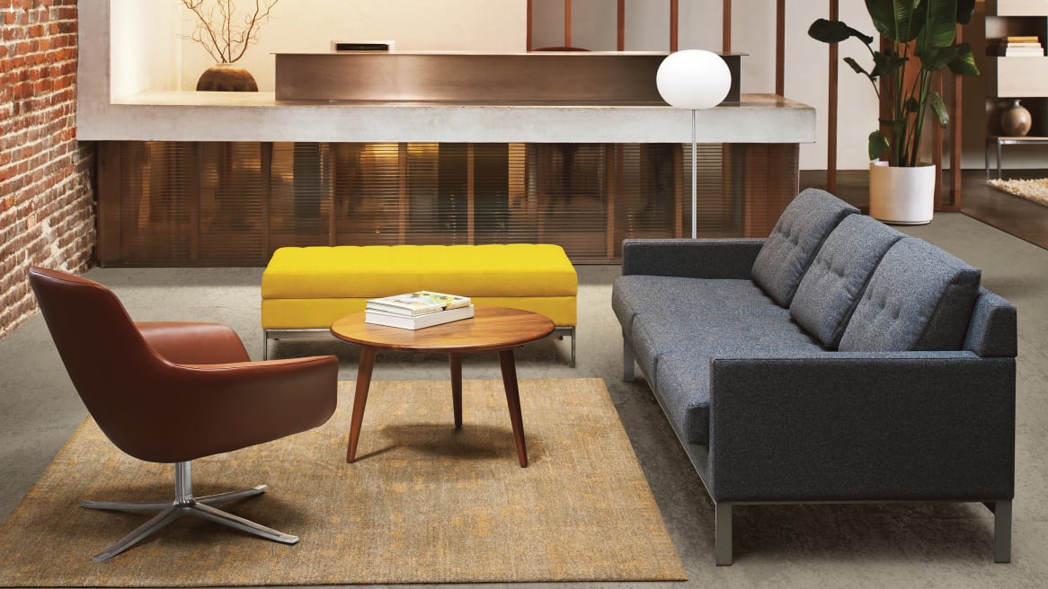 An office reception area with residential-inspired design features Bob lounge seating, a CH008 table, and a Millbrae Lifestyle Lounge sofa