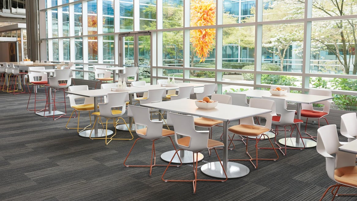 Shortcut X Base chairs around tables in eating area