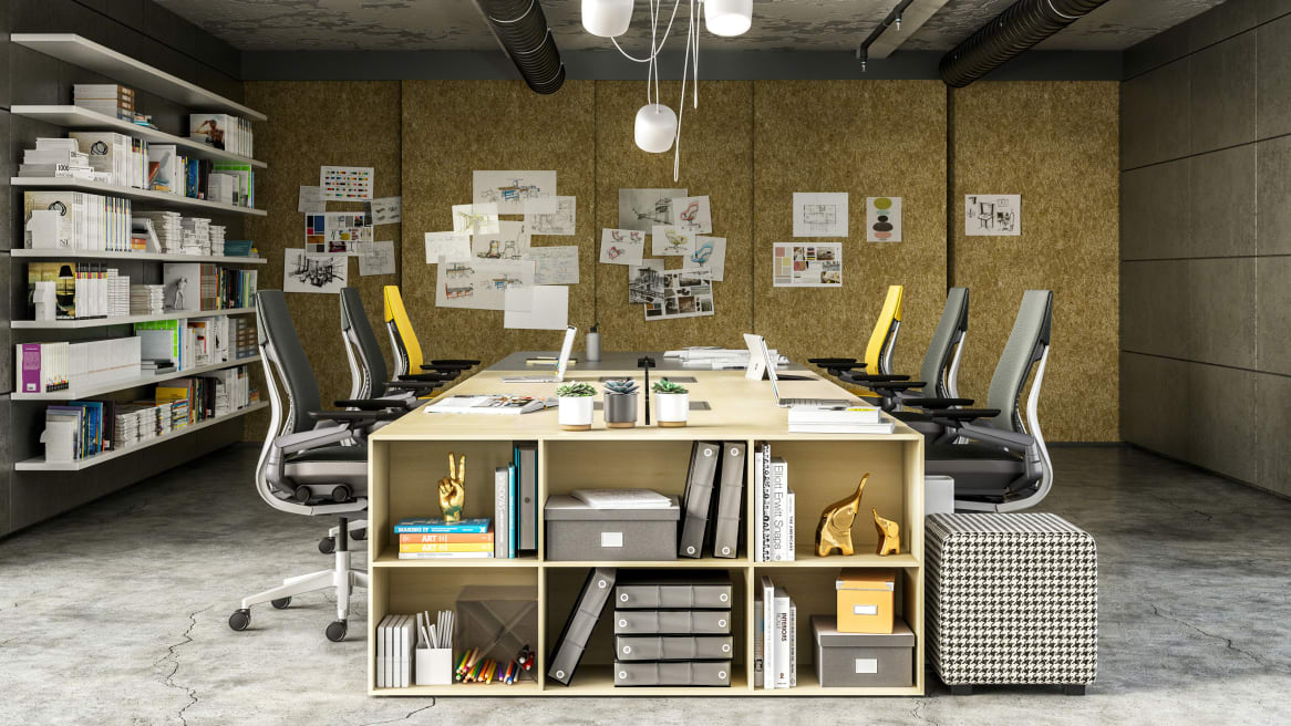 A Steelcase FrameOne benching system is used to create a workstation that also features Gesture chairs and Bivi Depot shelving