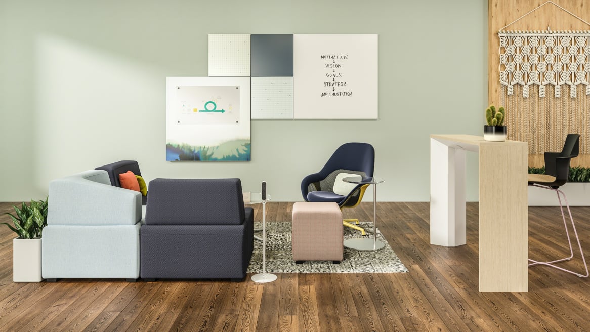 Ancillary space with lounge chairs and sofas, in front of a Motif Collaborative Panel System
