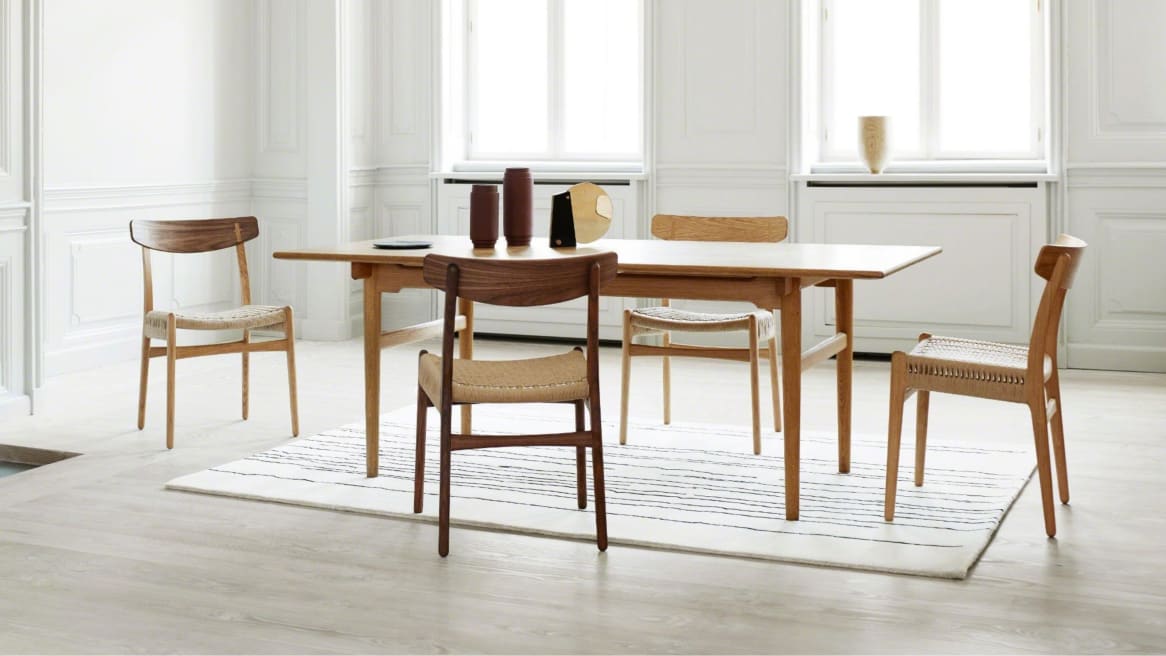 Carl Hansen & Son CH23 chairs placed around a rectangular table