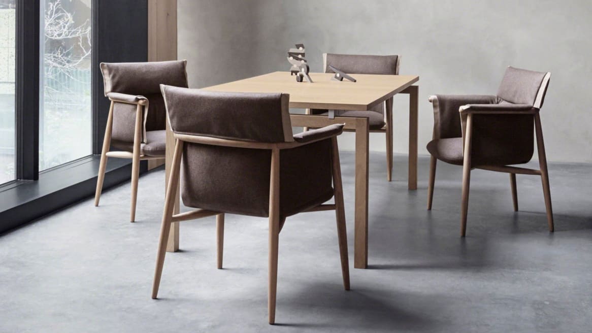 Embrace chairs CHE005 by Carl Hansen & Son arranged around a table