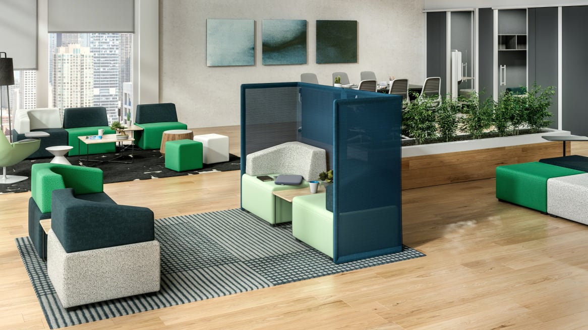 Work setting displaying B-Free modular lounge furniture by Steelcase