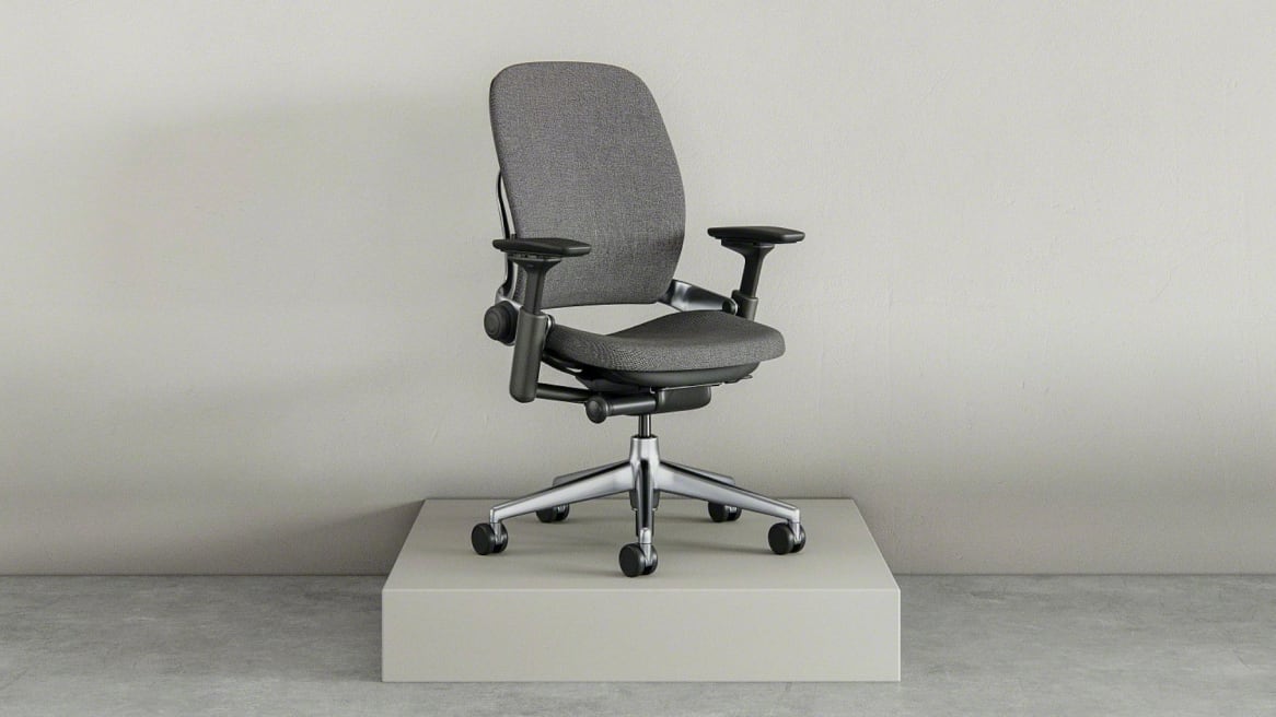 Full view of a gray Leap chair on a platform