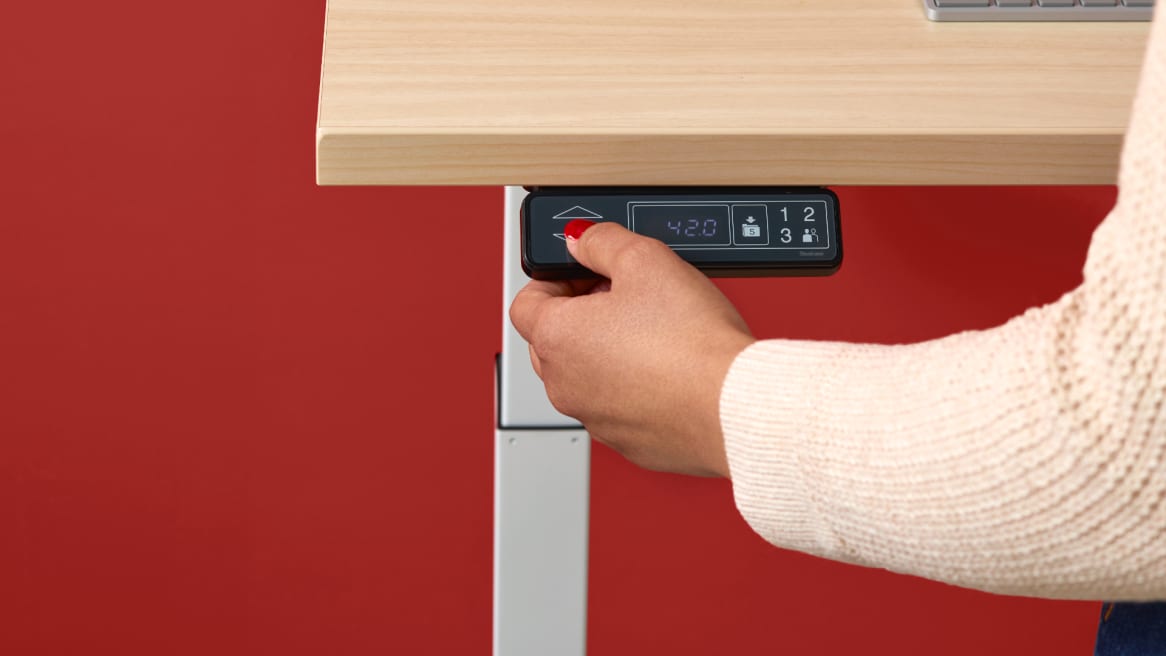 Close up of Bivi Height Adjustable Desk powered lever