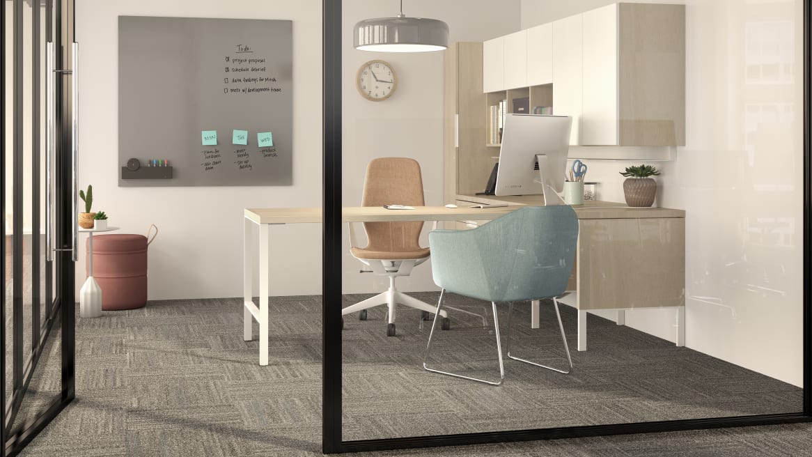 Rendering of a private office with a gray Sans™ markerboard on the wall, an orange Silq chair and a light blue guest chair.