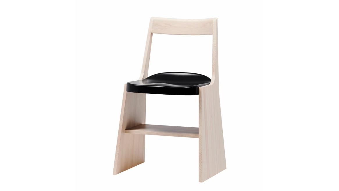 A light wood Fronda Chair with black seat on white background.
