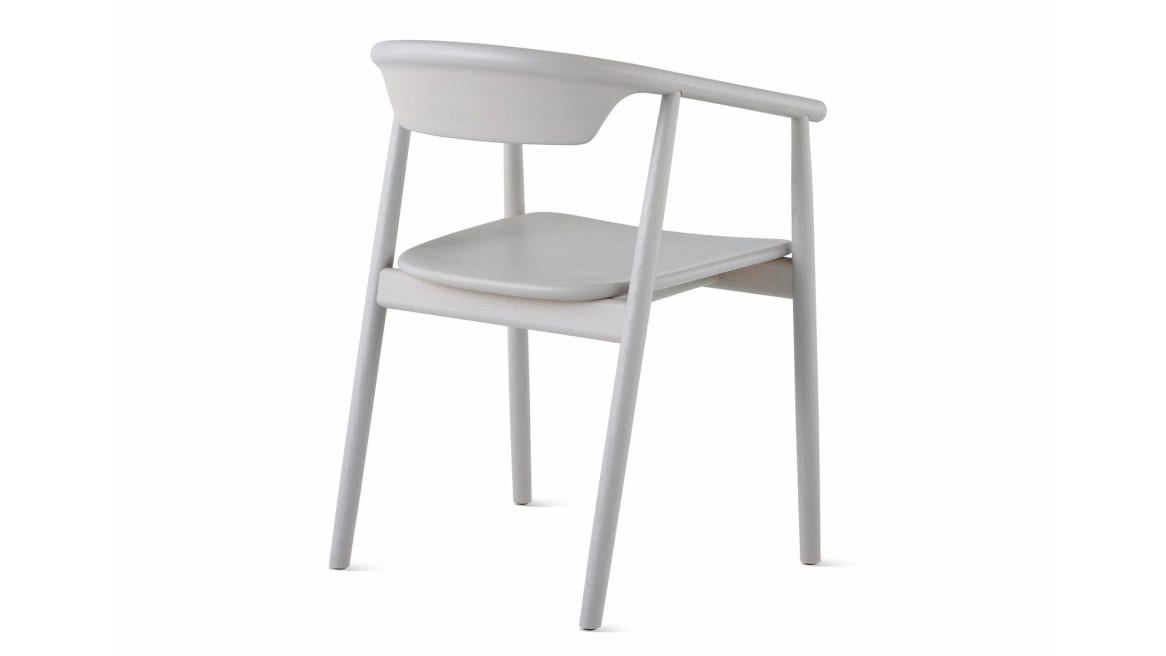 Back view of a gray Leva Armchair by Mattiazzi on white background.