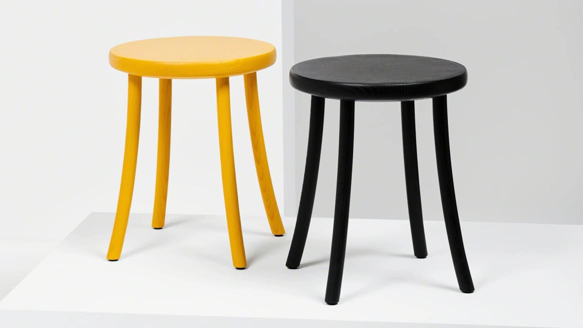 Two Zampa Low Stool on black and yellow ash