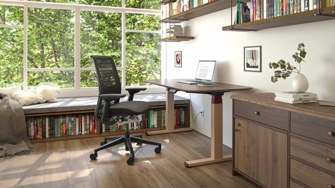 Think Chair and Solo Sit-to-Stand Desk in home office environment