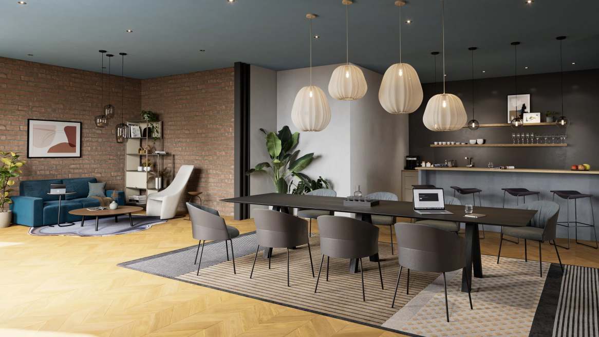 Office with chairs surrounding a desk.