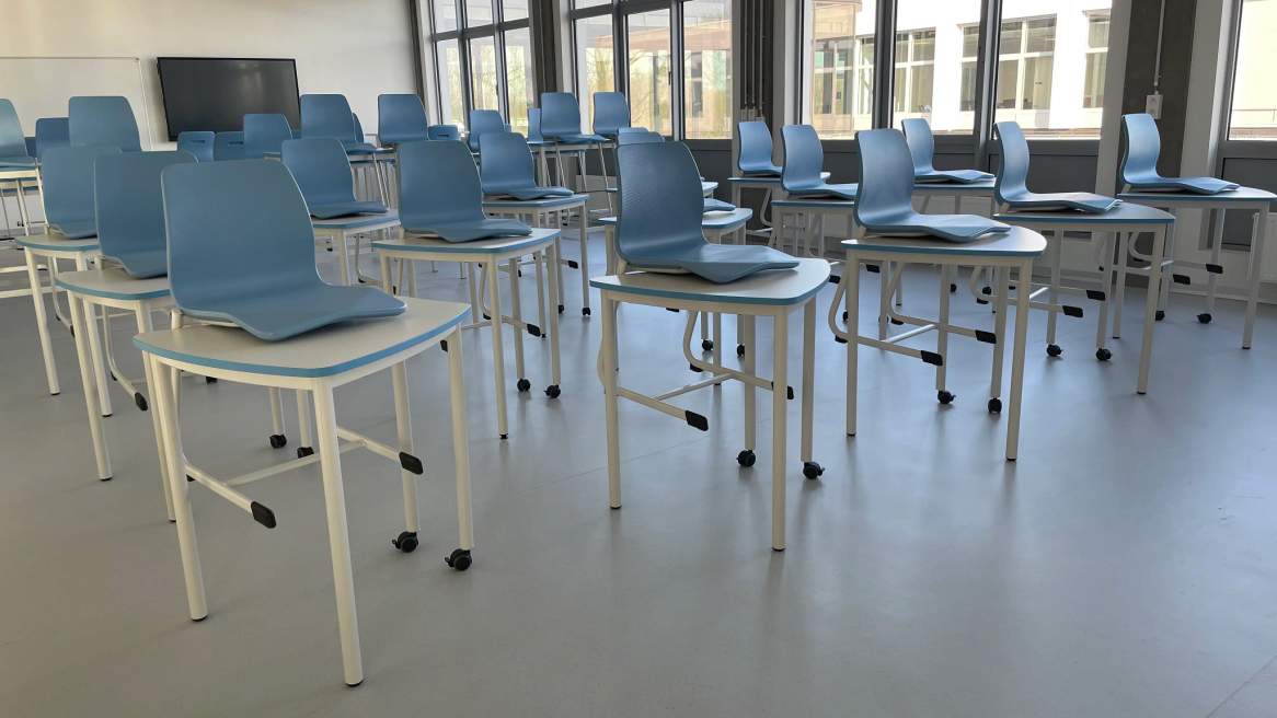 Vanerum Opti+ Seating and Desks collection in a classroom environment