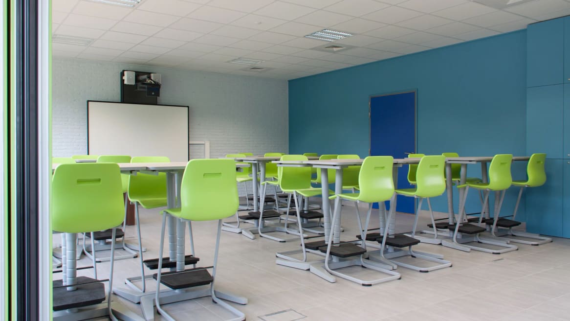Vanerum Opti+ Seating and Desks collection in a classroom environment